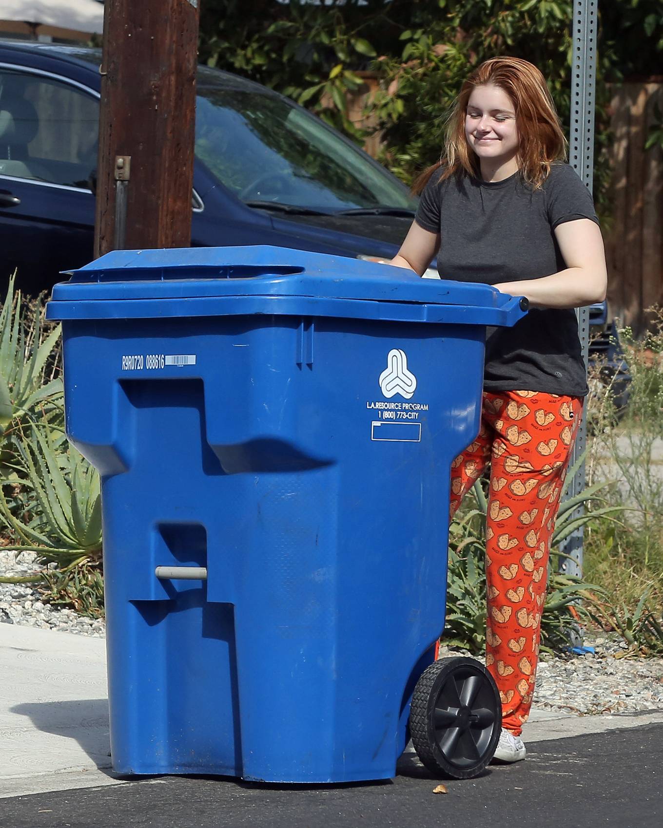 Ariel Winter - Putting out her recycled trash can in Los Angeles