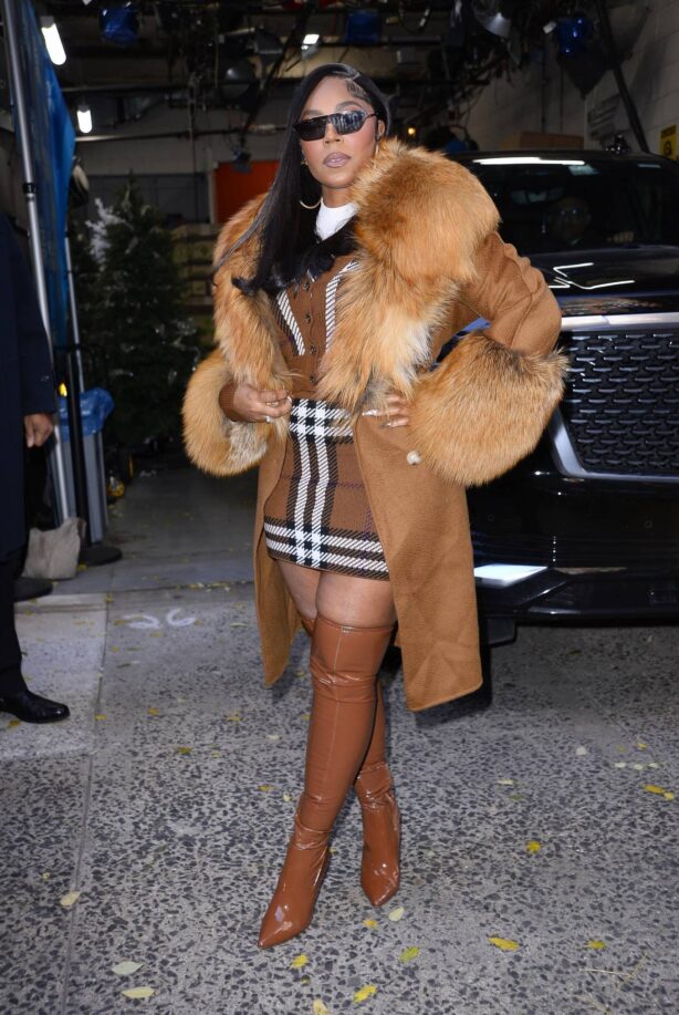 Ashanti - In a plaid mini dress as she exits the Kelly and Ryan talk show in NY