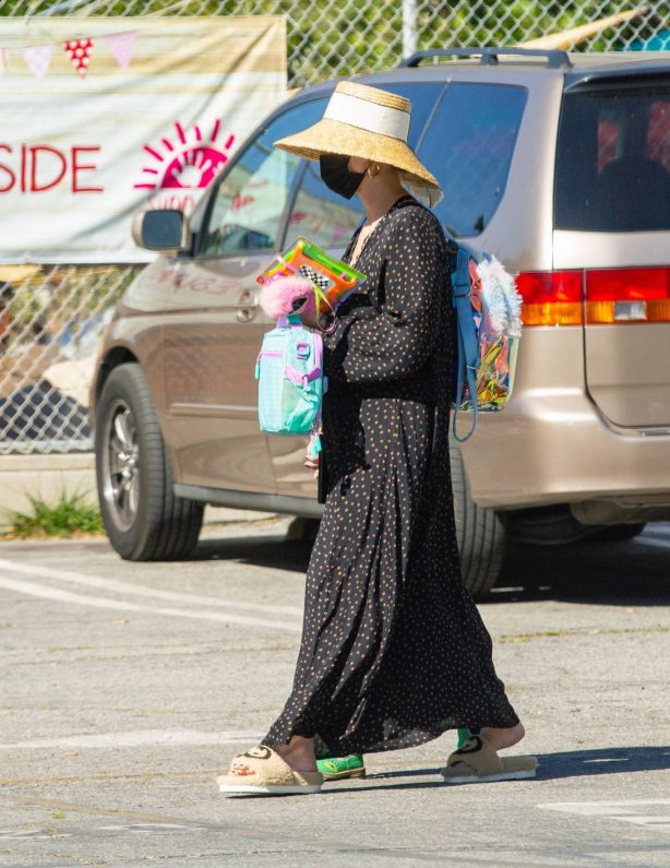 Ashlee Simpson - Wearing a straw hat and long dress in Los Angeles