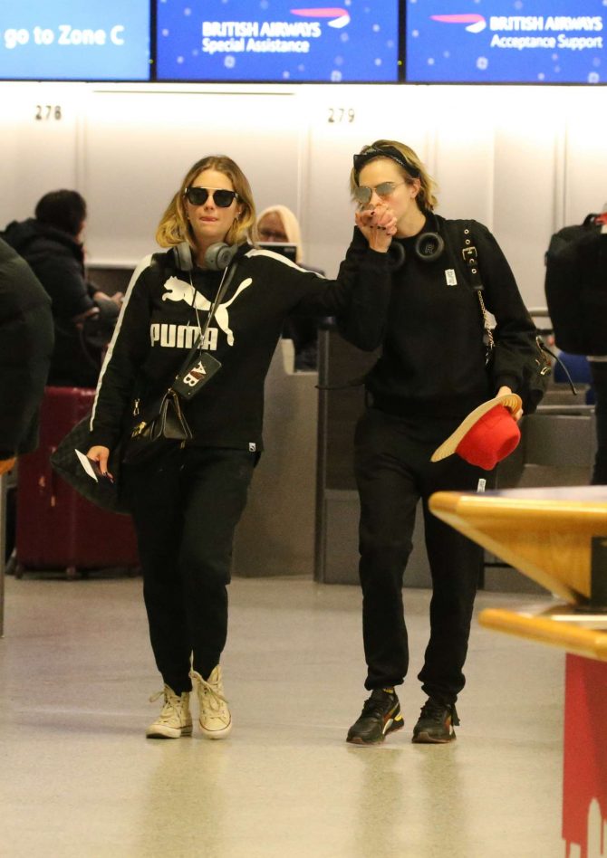 Ashley Benson and Cara Delevingne - Arrives at Gatwick Airport in England