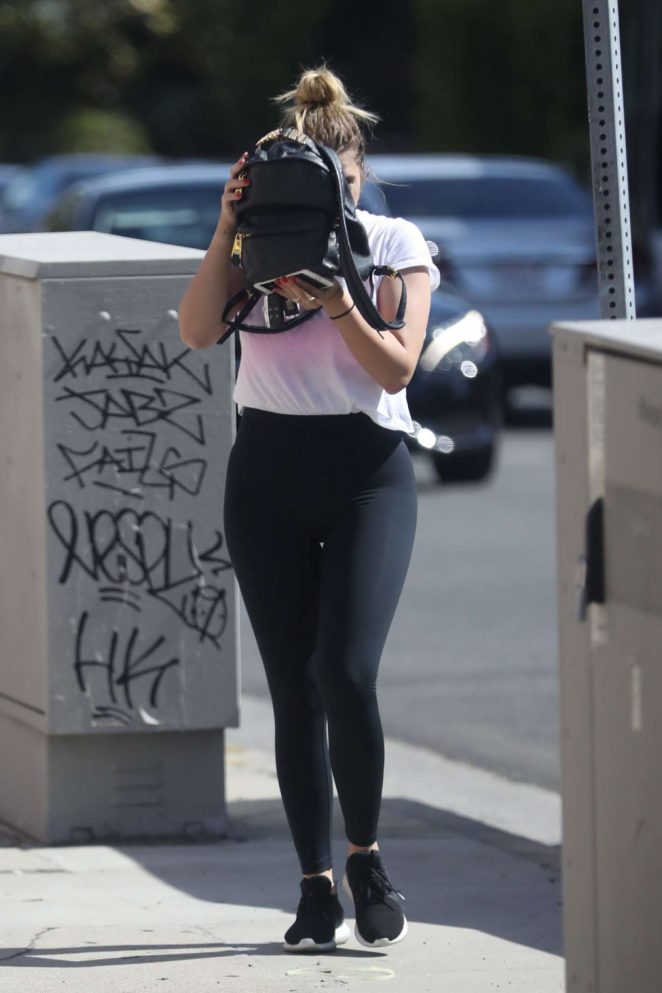 Ashley Benson - Covers her face while arriving to the spa in Los Angeles