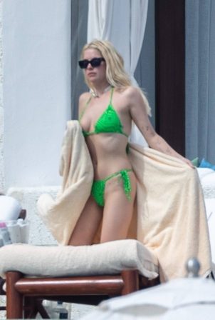 Ashley Benson - In a green bikini on vacation in Los Cabos - Mexico