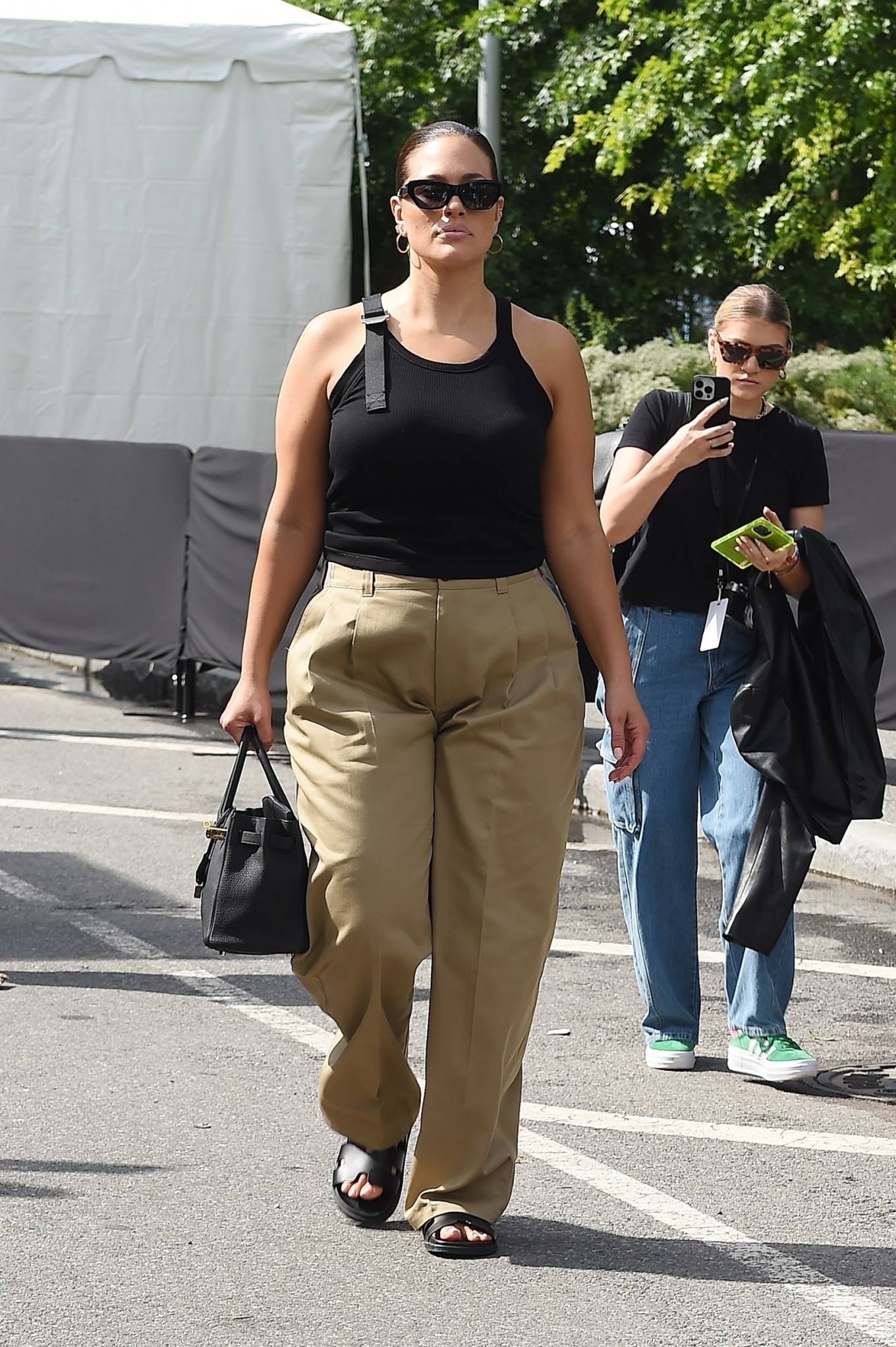 Ashley Graham - Leaving Michael Kors SS24 show at Domino Park in Brooklyn