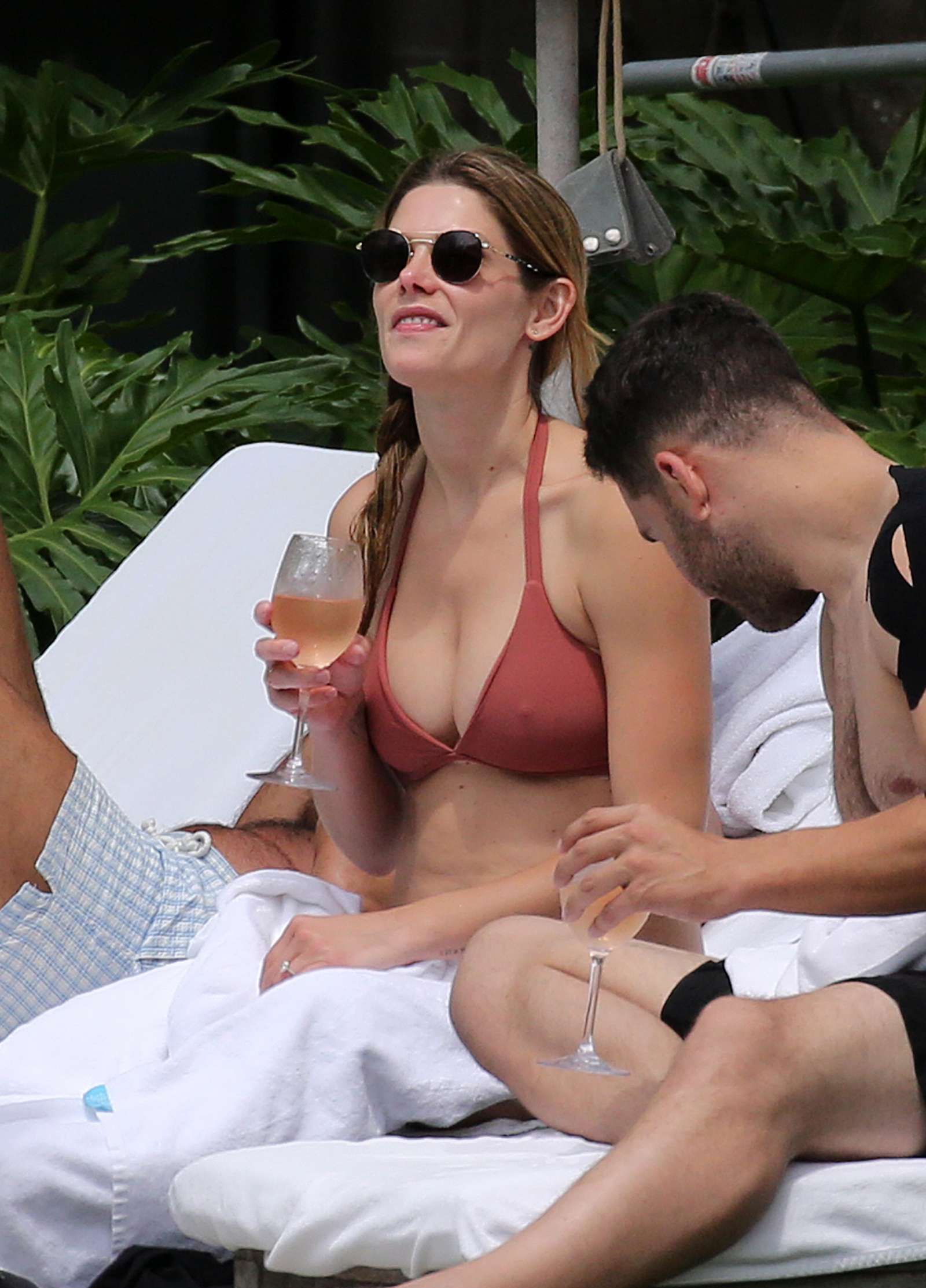 Ashley Greene in Bikini at the pool in Miami. 