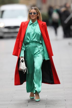 Ashley Roberts - Dons bright green trousers and bright red coat at Heart radio in London