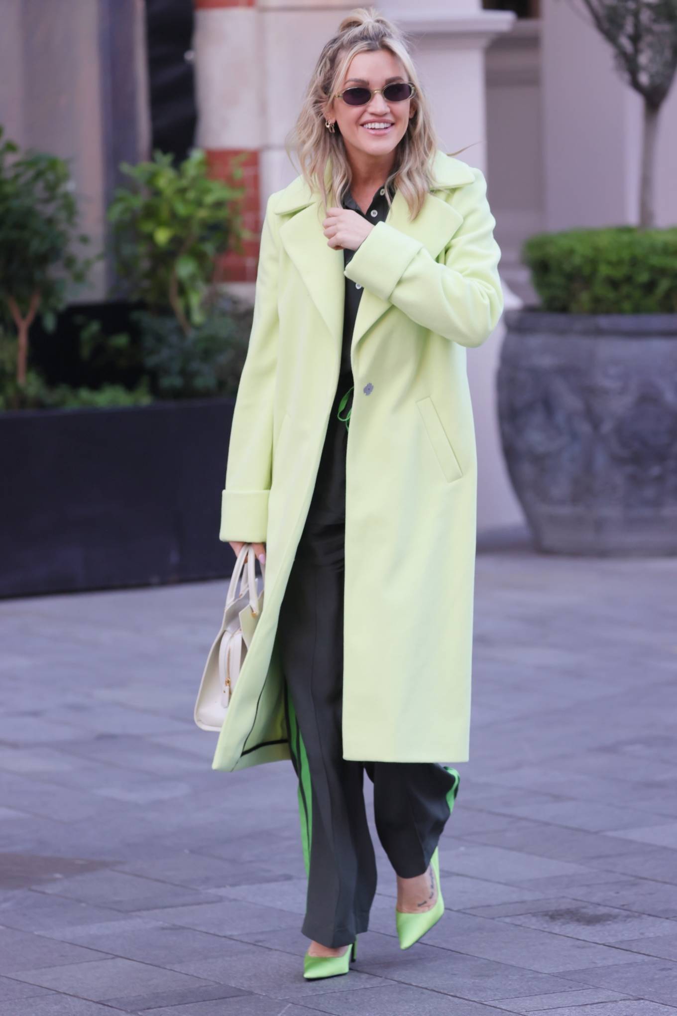 Ashley Roberts 2021 : Ashley Roberts – In a lime green trench coat at Heart radio in London-06
