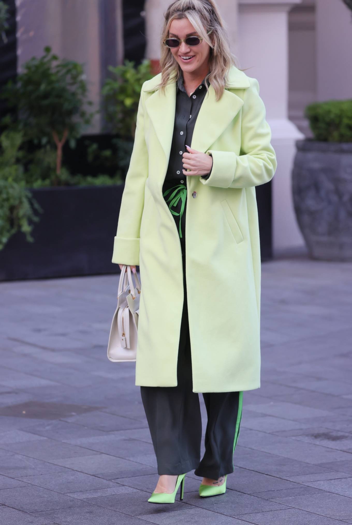 Ashley Roberts 2021 : Ashley Roberts – In a lime green trench coat at Heart radio in London-10