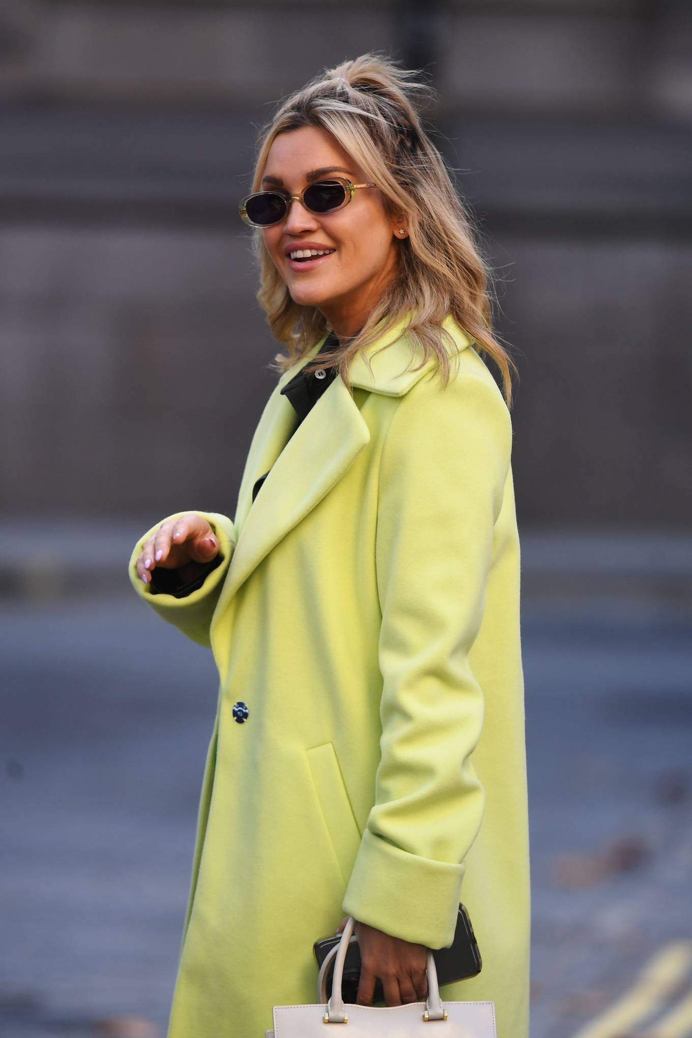 Ashley Roberts 2021 : Ashley Roberts – In a lime green trench coat at Heart radio in London-35