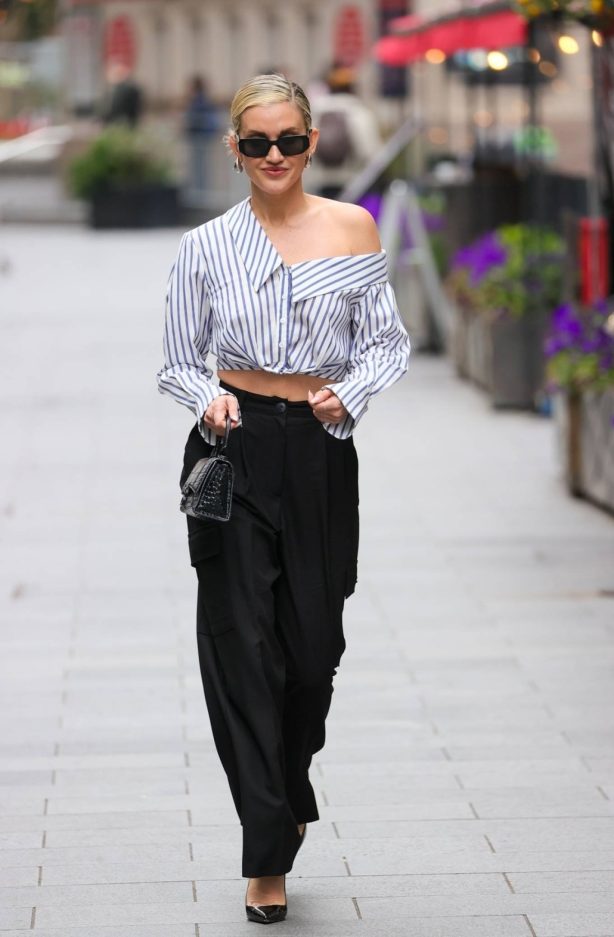 Ashley Roberts - In a short shirt and stylish trousers in London