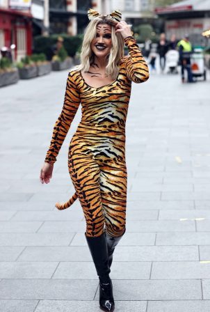Ashley Roberts - In a Tiger print catsuit at the Heart radio studios in London