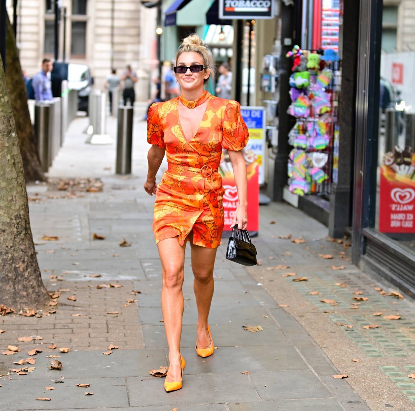 Ashley Roberts 2021 : Ashley Roberts – Wears striking orange mini dress at Heart radio in London-09