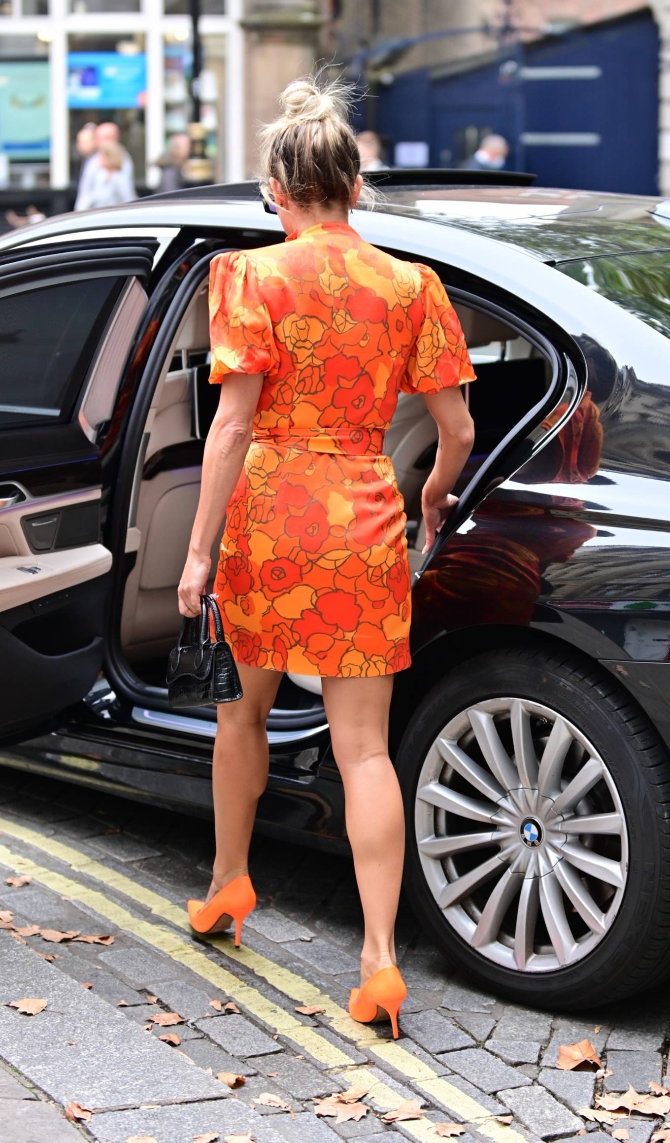 Ashley Roberts 2021 : Ashley Roberts – Wears striking orange mini dress at Heart radio in London-12