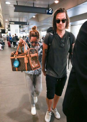 Ashley Tisdale and Christopher French at LAX Airport in LA
