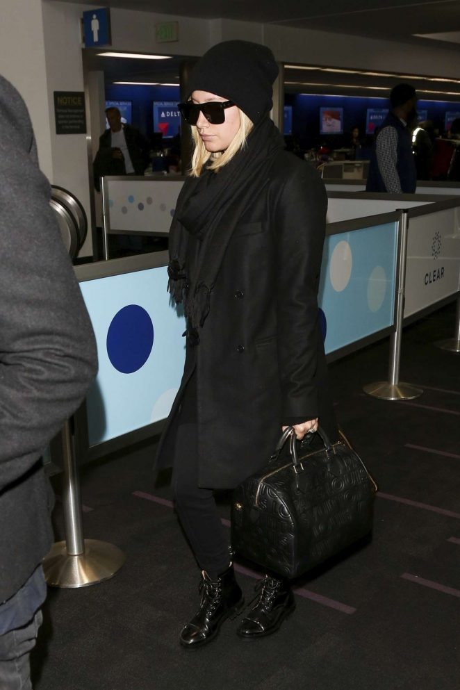 Ashley Tisdale - Arrives at LAX airport in Los Angeles