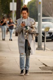 Ashley Tisdale in a grey downcoat in Los Angeles