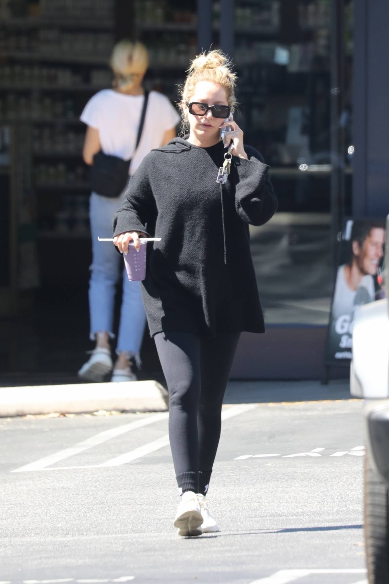 Ashley Tisdale 2022 : Ashley Tisdale – keeps it cozy in all-black loungewear at Erewhon in West Hollywod-04