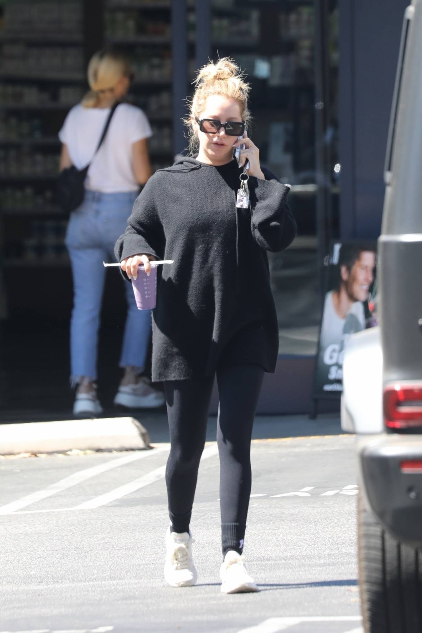 Ashley Tisdale 2022 : Ashley Tisdale – keeps it cozy in all-black loungewear at Erewhon in West Hollywod-09