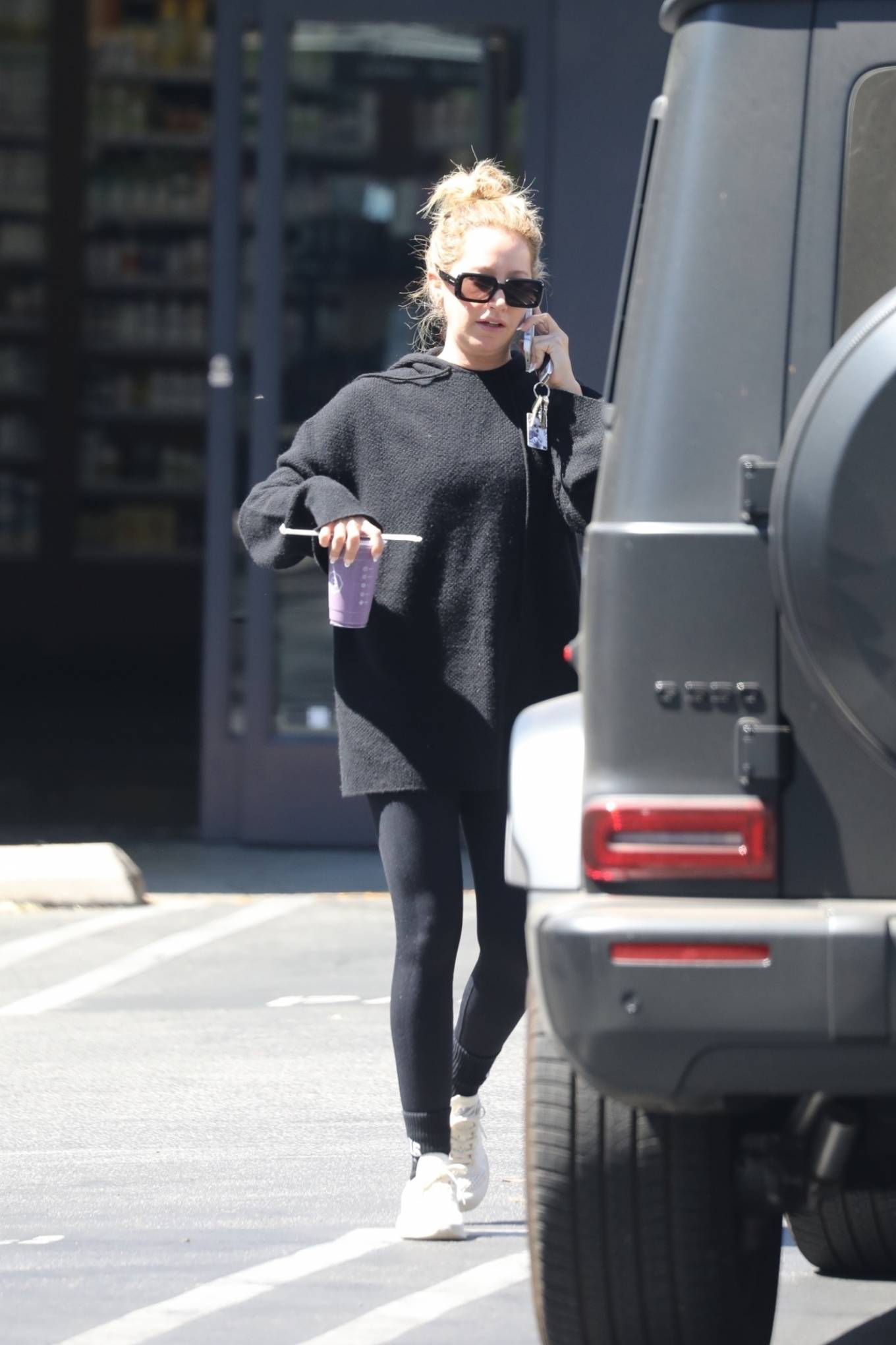 Ashley Tisdale 2022 : Ashley Tisdale – keeps it cozy in all-black loungewear at Erewhon in West Hollywod-11