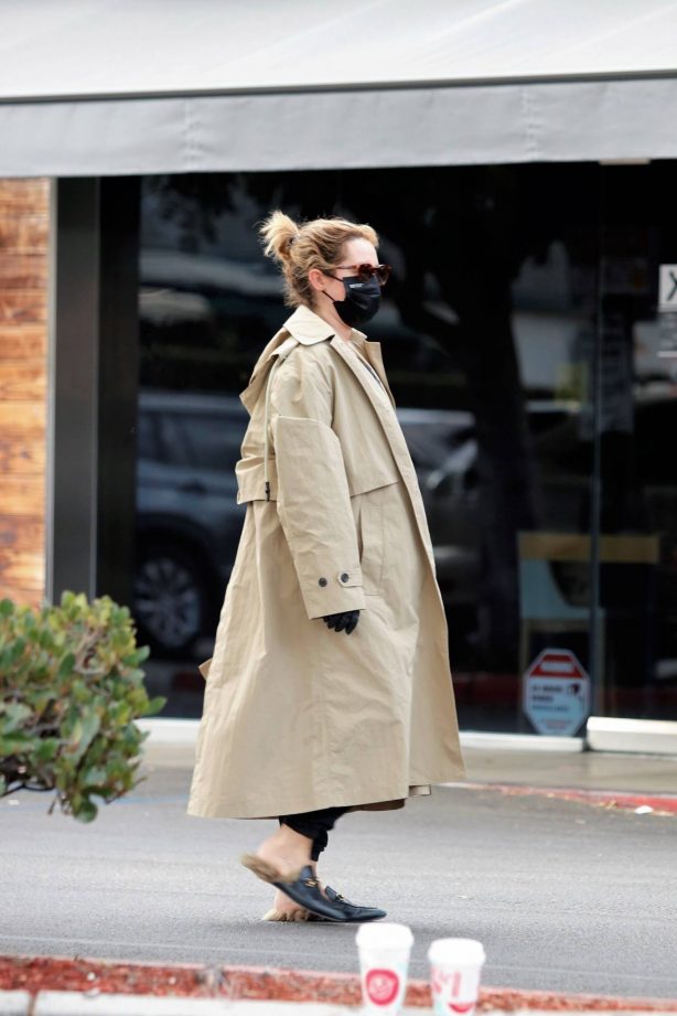 Ashley Tisdale - Wears a trench coat in Los Feliz