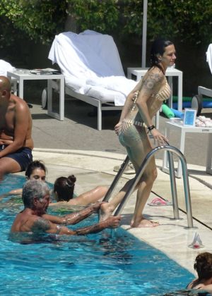 Asia Argento - Bikini Candids at the hotel swimming pool in Rome