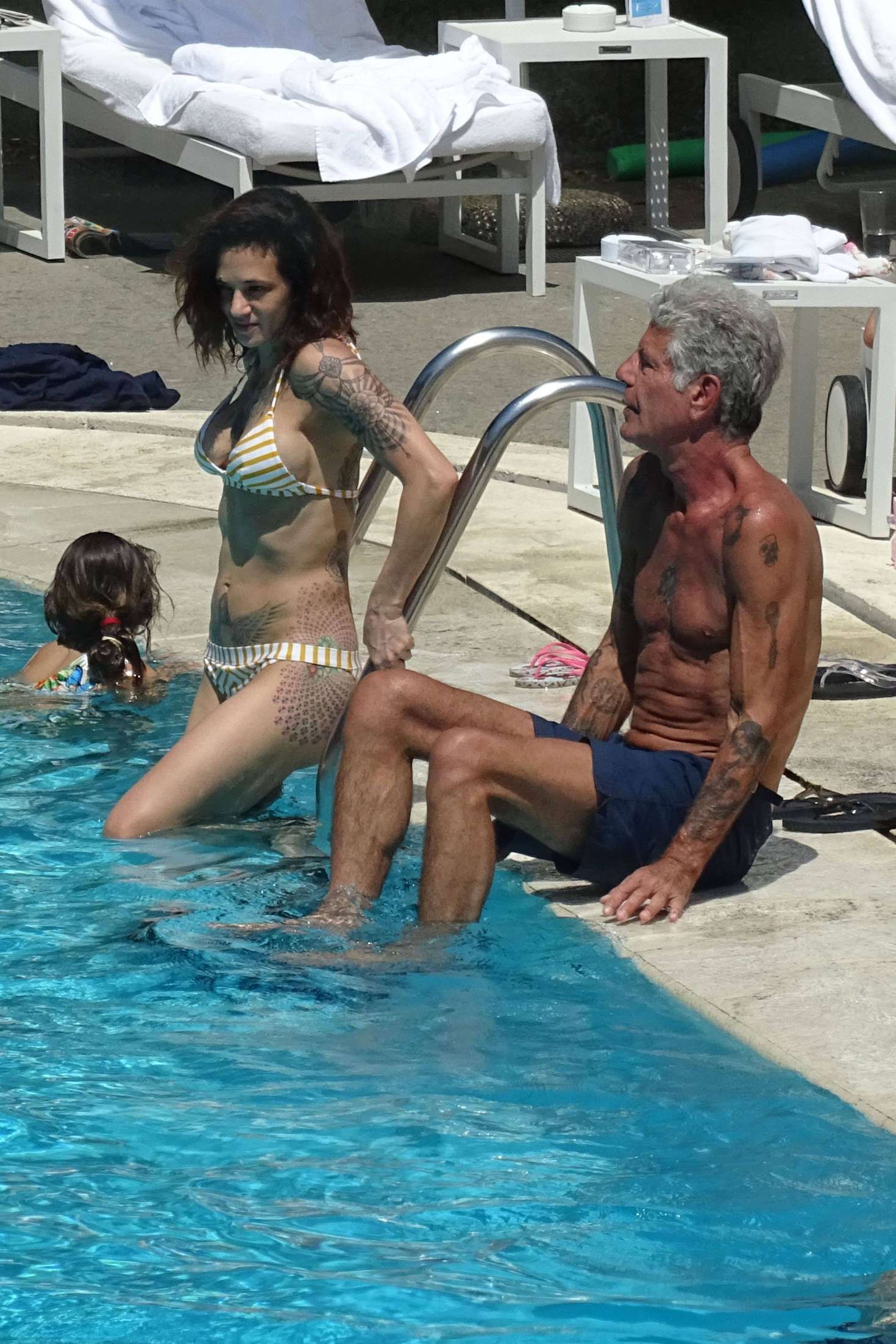 Asia Argento - Bikini Candids at the hotel swimming pool in Rome. 