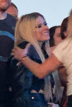 Avril Lavigne - Spotted with a new mystery man at the When We Were Young Festival in LA