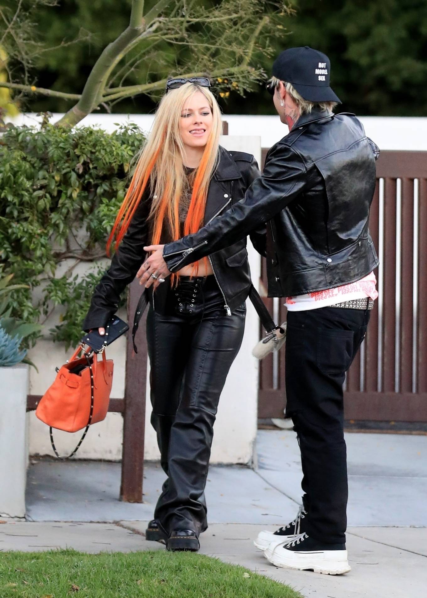 Avril Lavigne - With Mod Sun in West Hollywood wearing matching black leather outfits