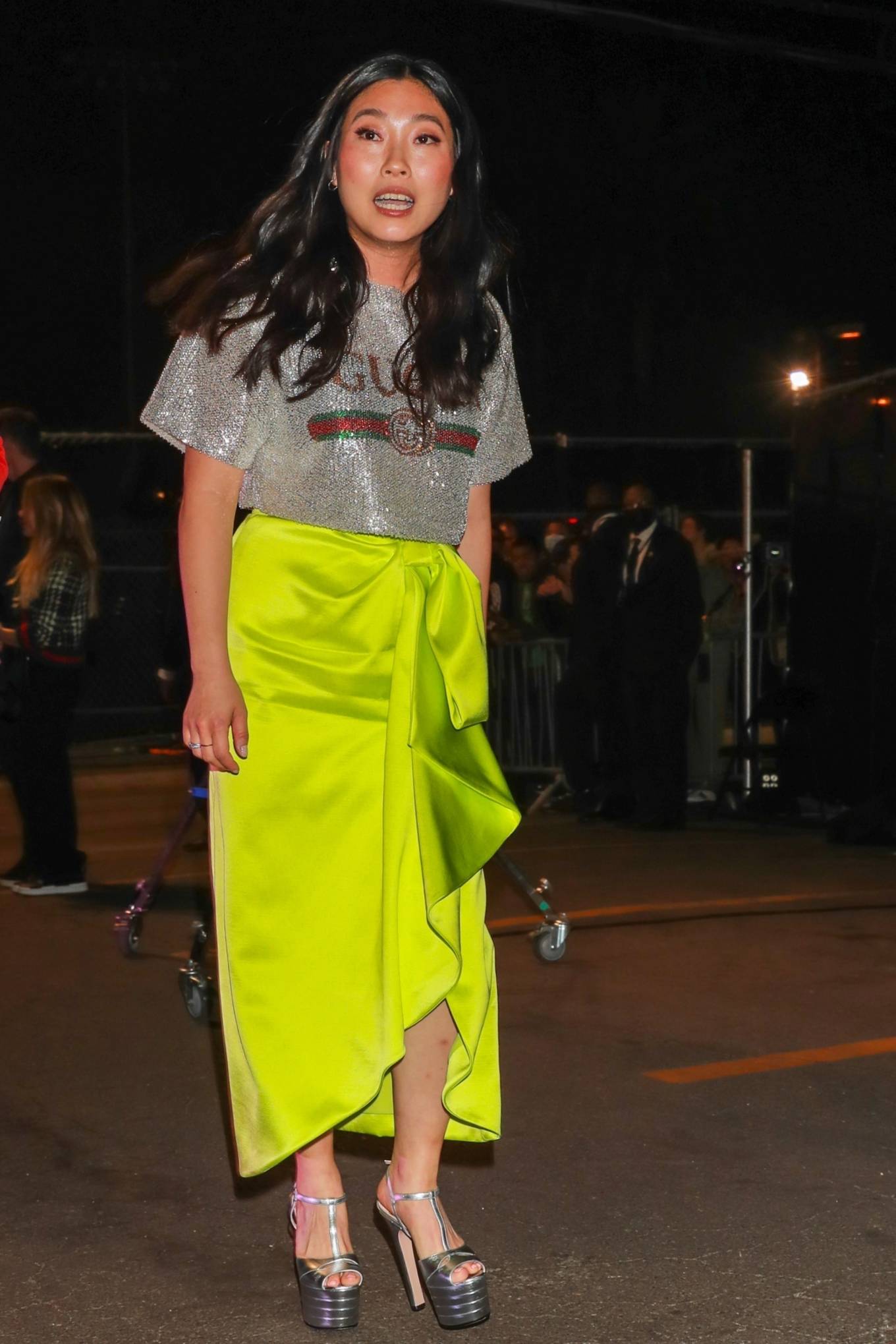 Awkwafina - Pictured in neon yellow at the Gucci Fashion Show in Hollywood