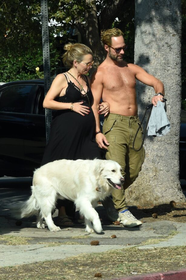 Becki Newton - With shirtless Chris Diamantopoulos with their dog in Los Angeles