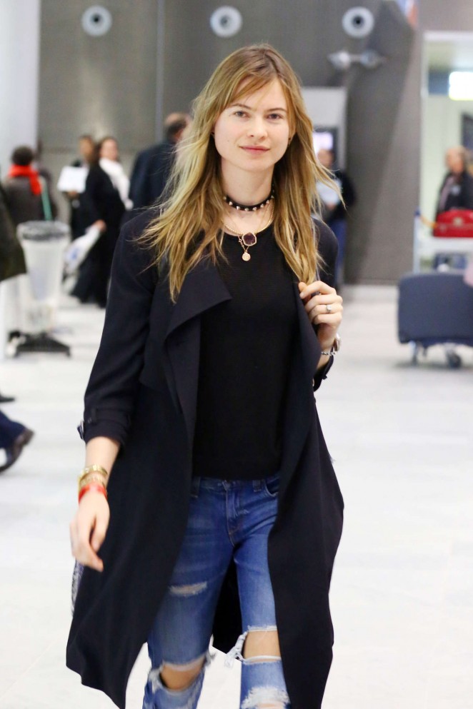 Behati Prinsloo in Ripped Jeans at Charles de Gaulle Airport in France