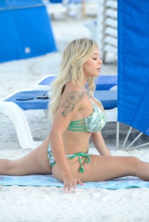 Bella Bunnie Amor - Posing in a bikini at the beach in Miami