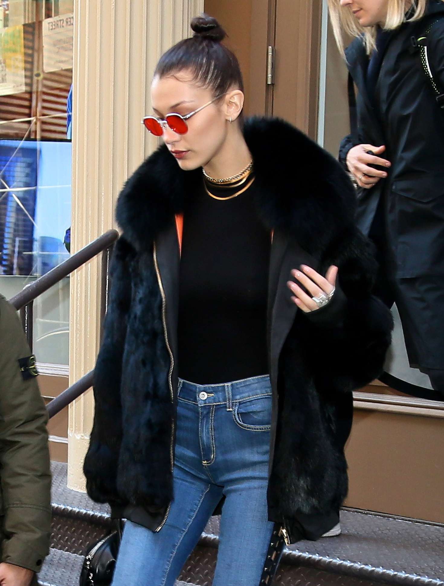 Bella Hadid in Fur Coat and Jeans out in New York