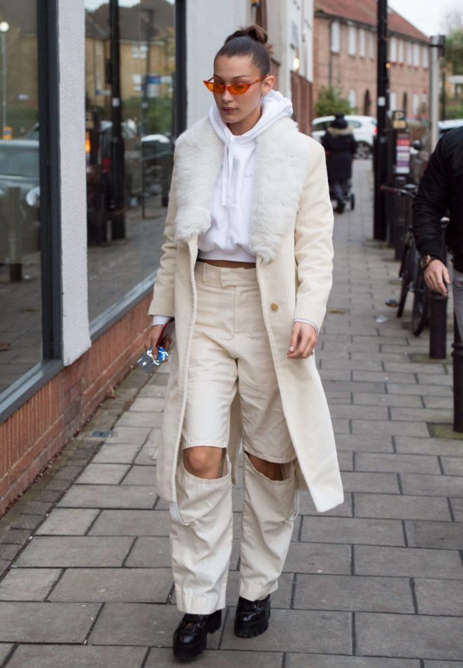 Bella Hadid in Long Coat and Ripped Pants out in London