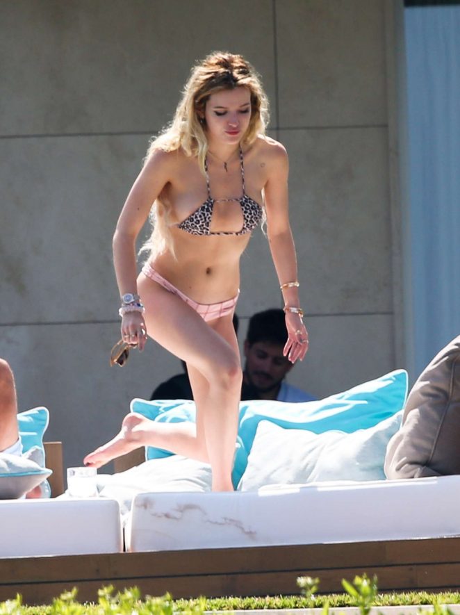 Bella Thorne in Bikini Sunbathing in Cannes