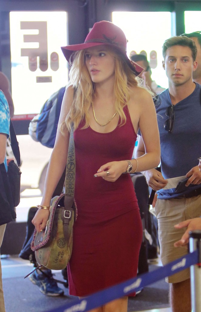 Bella Thorne in Red Mini Dress at LAX Airport in LA