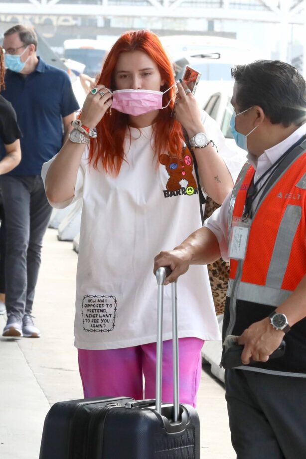 Bella Thorne - Seen catching a flight out of LAX