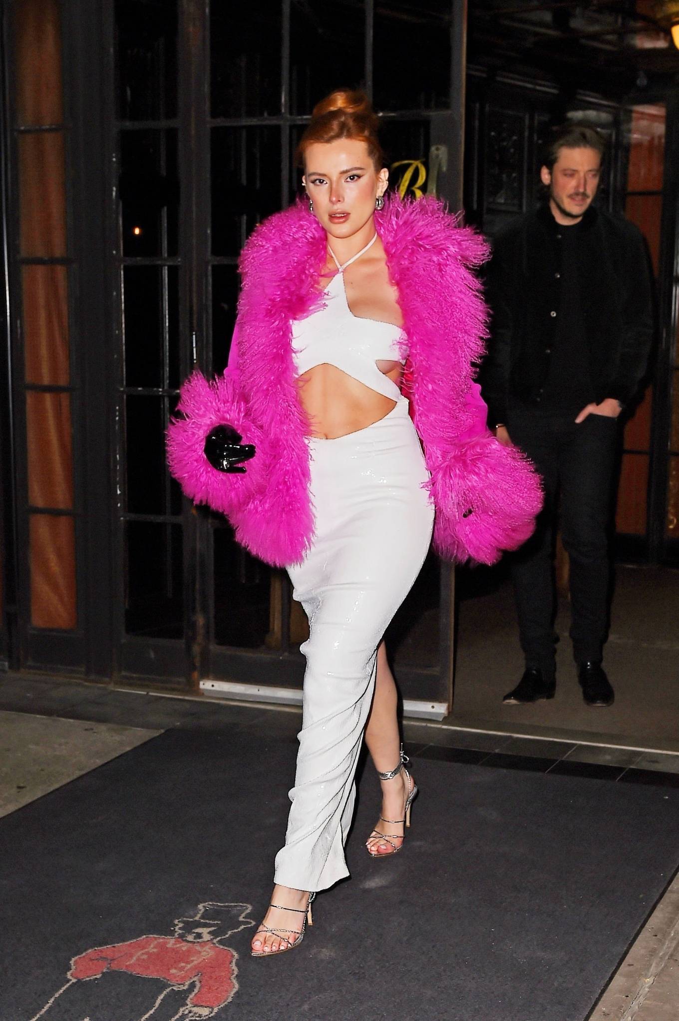 Bella Thorne - Seen on Valentine's Day in a pink fur coat with boyfriend Mark Emms in NY