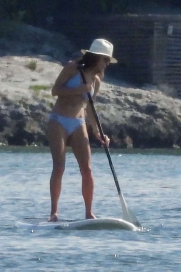 Bethenny Frankel in Bikini Paddleboarding at a beach in Cancun
