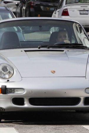 Bianca Censori - Driving her new Porsche in Los Angeles