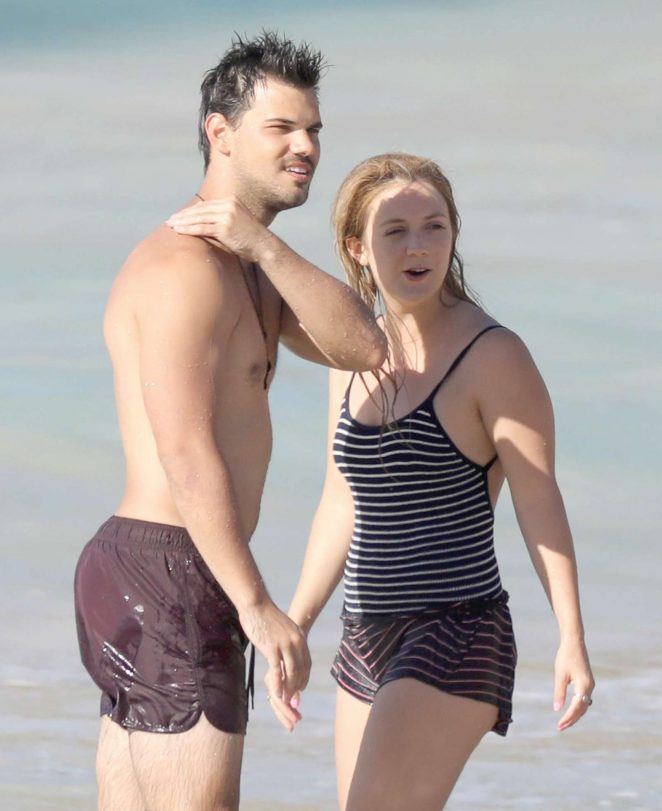 Billie Lourd and Taylor Lautner on the beach in St. Barts
