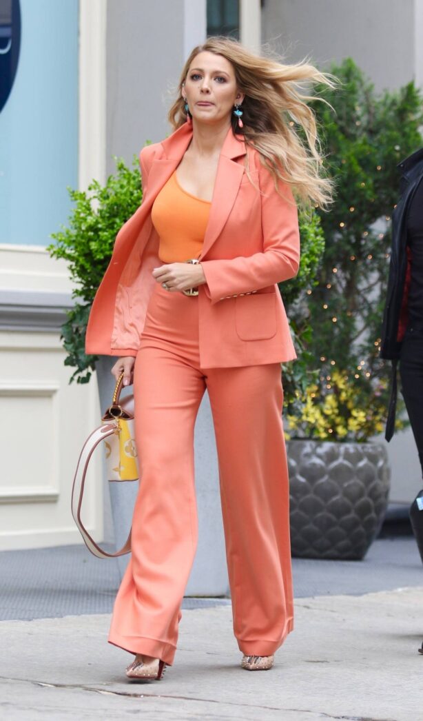 Blake Lively - Rocks in a coral pantsuit while out in New York
