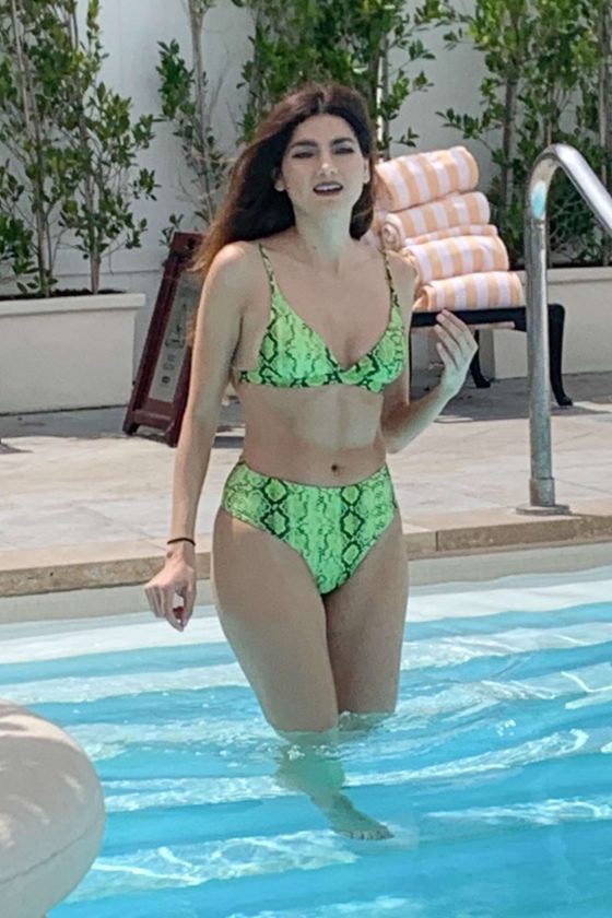 Blanca Blanco in Green Bikini on the pool in Beverly Hills