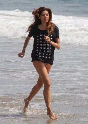 Blanca Blanco in T-shirt at a beach in Malibu