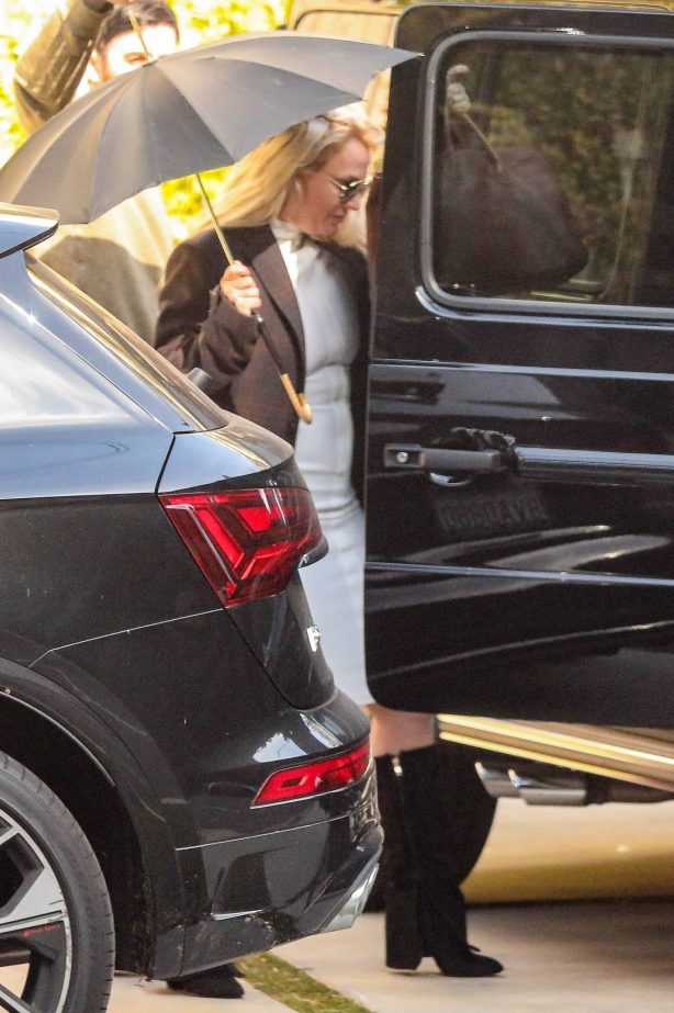 Britney Spears - Exits her manager Cade Hudson's house in Los Angeles