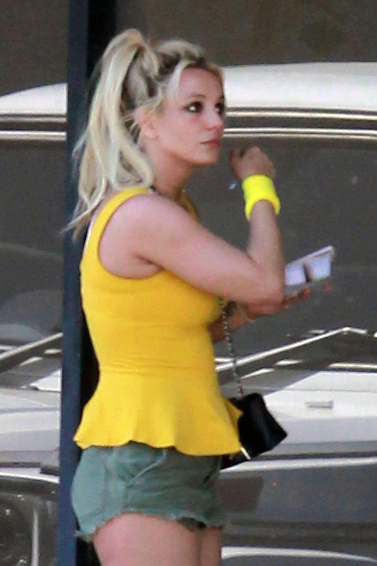 Britney Spears in a Bright Yellow Tank Top out in Los Angeles