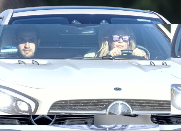 Britney Spears - Seen driving her sportscar with boyfriend Sam Asghari in Westgate