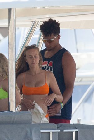 Brittany Matthews - In a orange bikini on a yacht in Cabo San Lucas