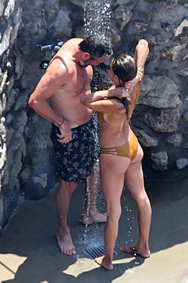Brooke Burke - In a bikini with her fiancee Scott Rigsby in Positano