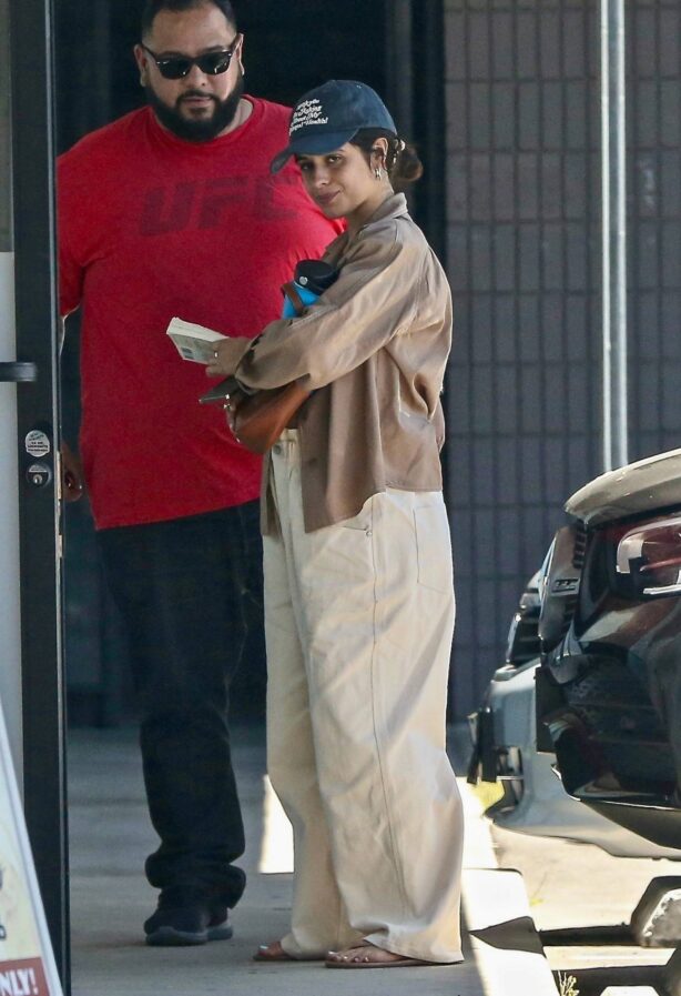 Camila Cabello - In oversized pants and a crop top out in West Hollywood