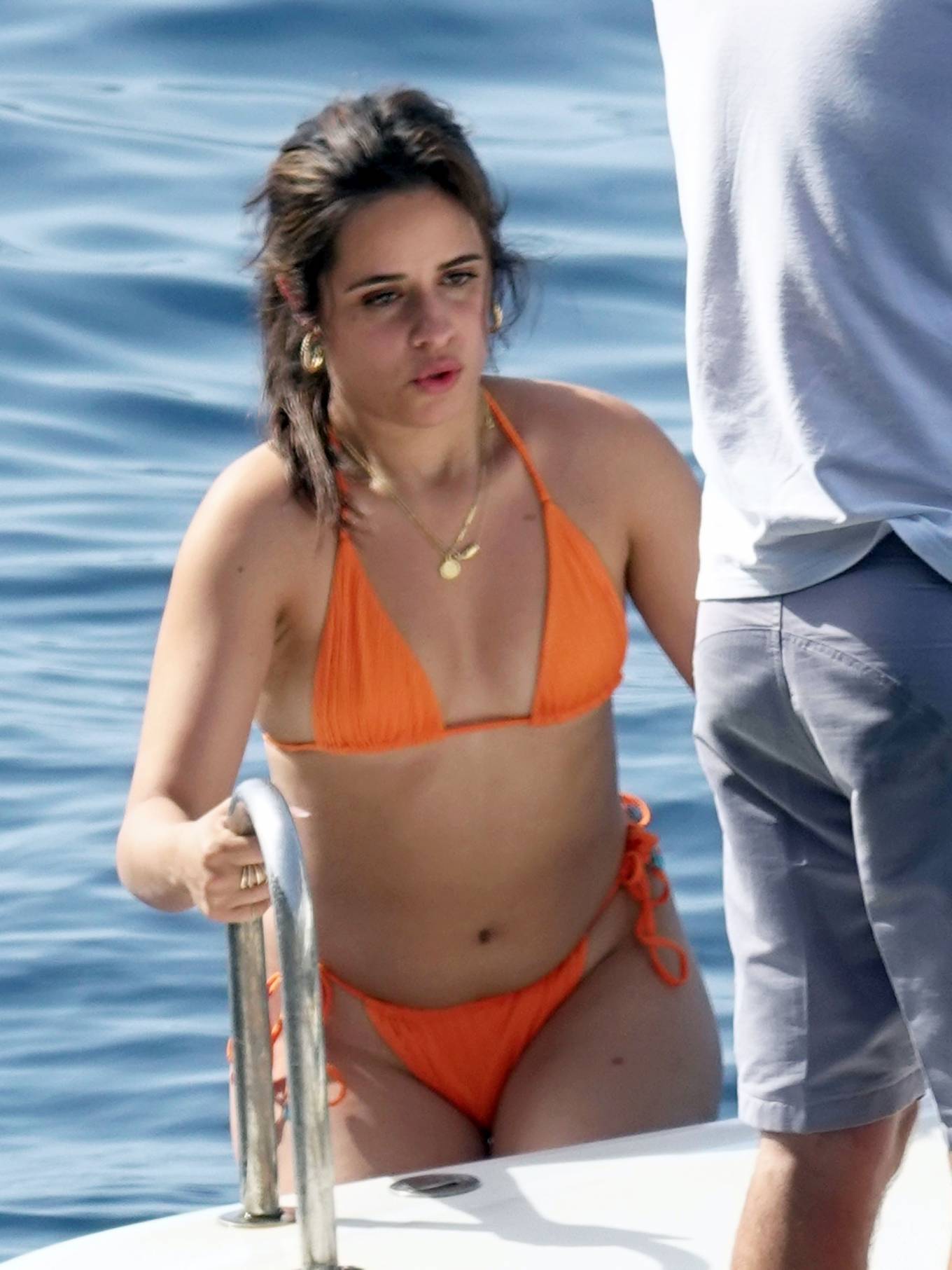 Camila Cabello Puts On Cheeky Display In Orange Bikini